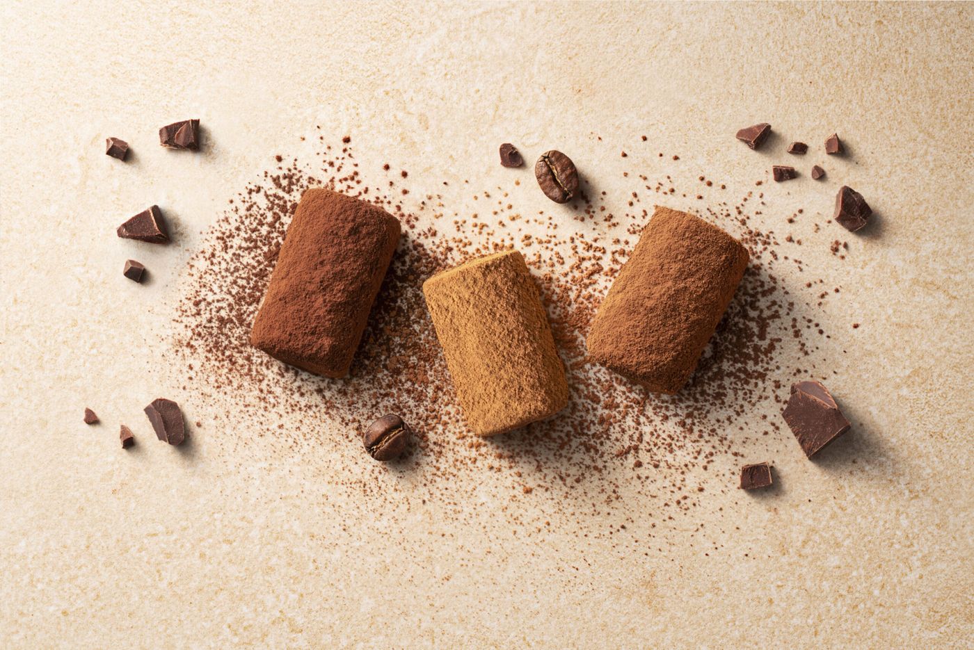 Trois truffes Leonidas poudrées de cacao